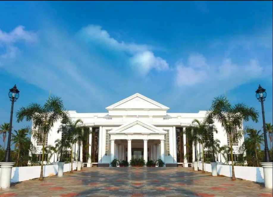 Exterior facade and entrance of Camelot Hotel & Convention Centre in Alleppey