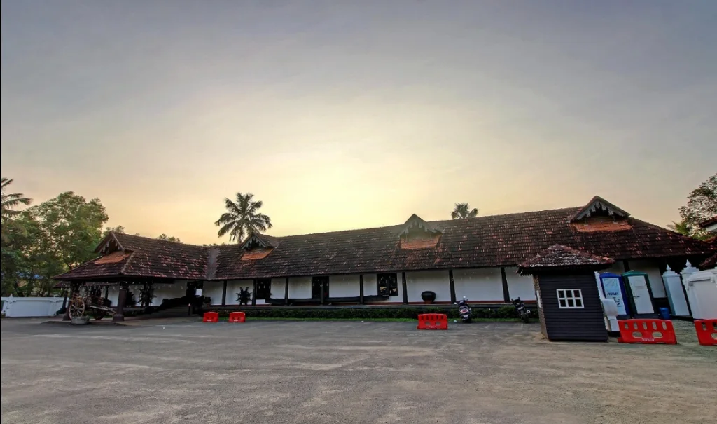 Exterior facade and entrance of Travancore Palace Hotel in Alleppey