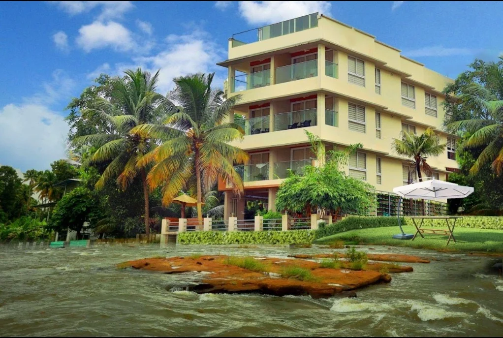 Exterior facade and entrance of Riverine Suites Resort in Athirapally