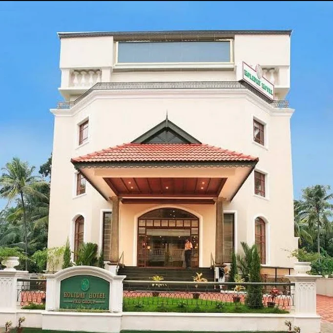 Exterior facade and entrance of VKG Group Holiday Hotel in Cherai
