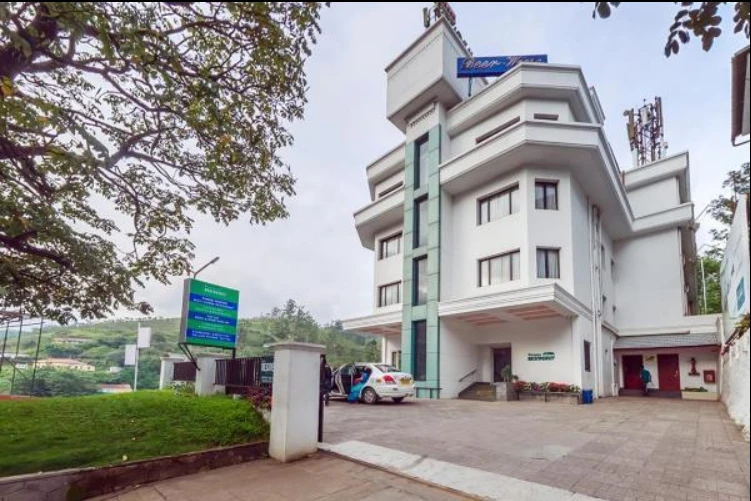 Exterior facade and entrance of Issac Residency in Munnar