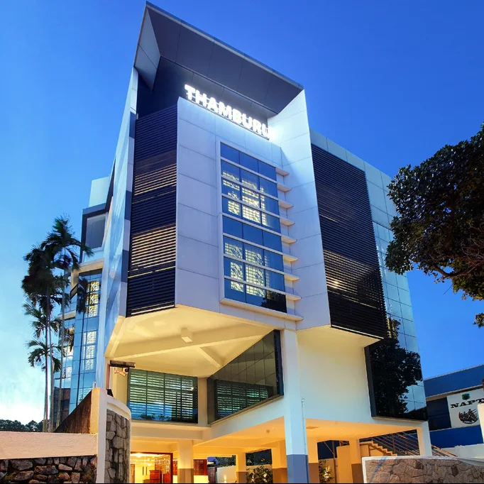 Exterior facade and entrance of Hotel Thamburu International in Trivandrum
