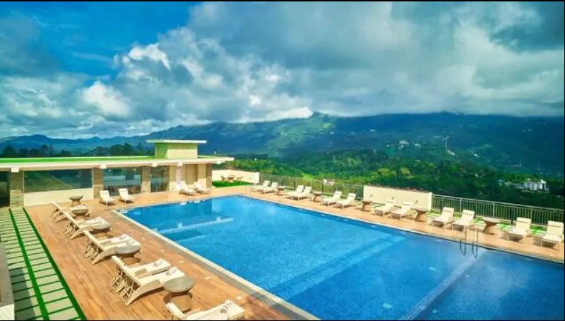 Vibe Munnar rooftop pool and resort landscape